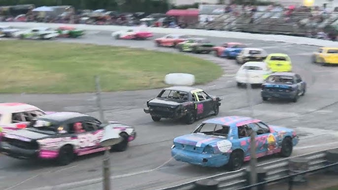 Crown Vic race cars on track for Driver Info hero background